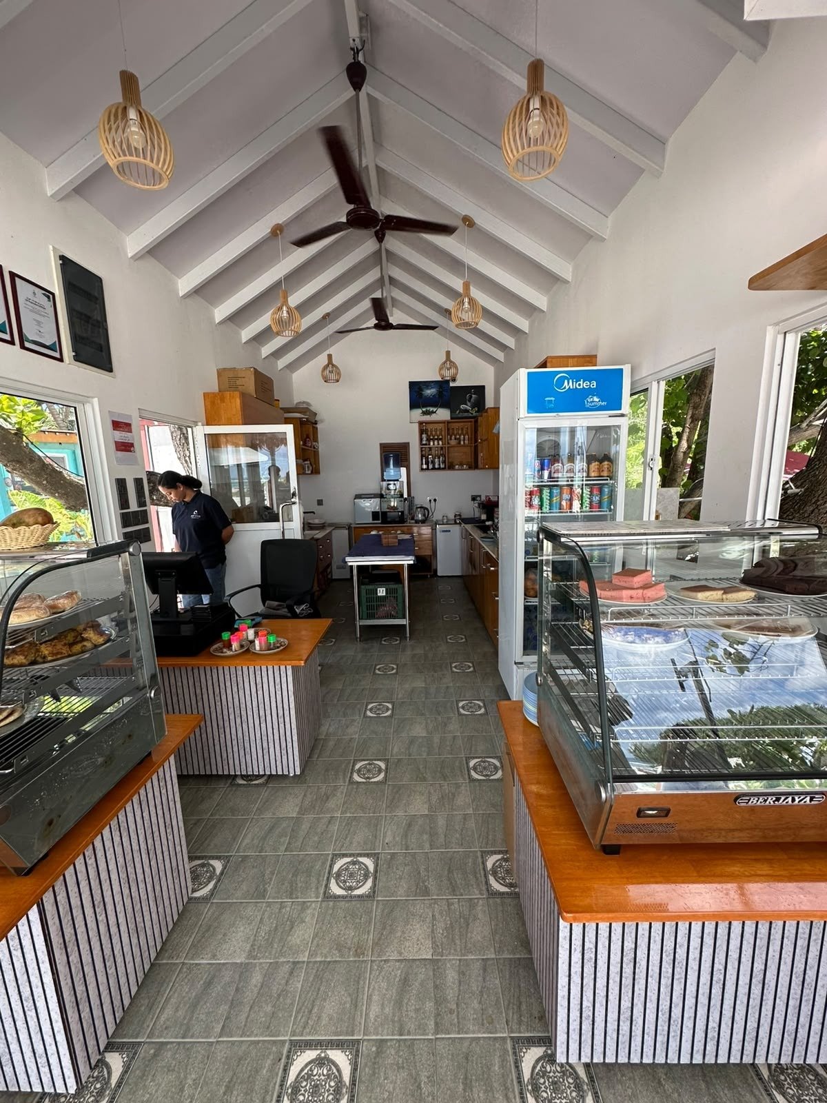 The service counter today, with white panels and orange tops