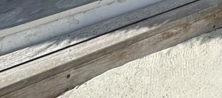 Close-up of grey weathered timber planks